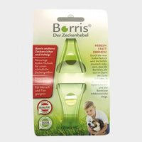 Borris Zeckenhebel aus 95 % recyceltem Kunststoff mit Verpackung, ausgestattet mit integrierter Doppellupe und patentierter Kufen-Technik für eine sichere Zeckenentfernung bei Mensch und Tier